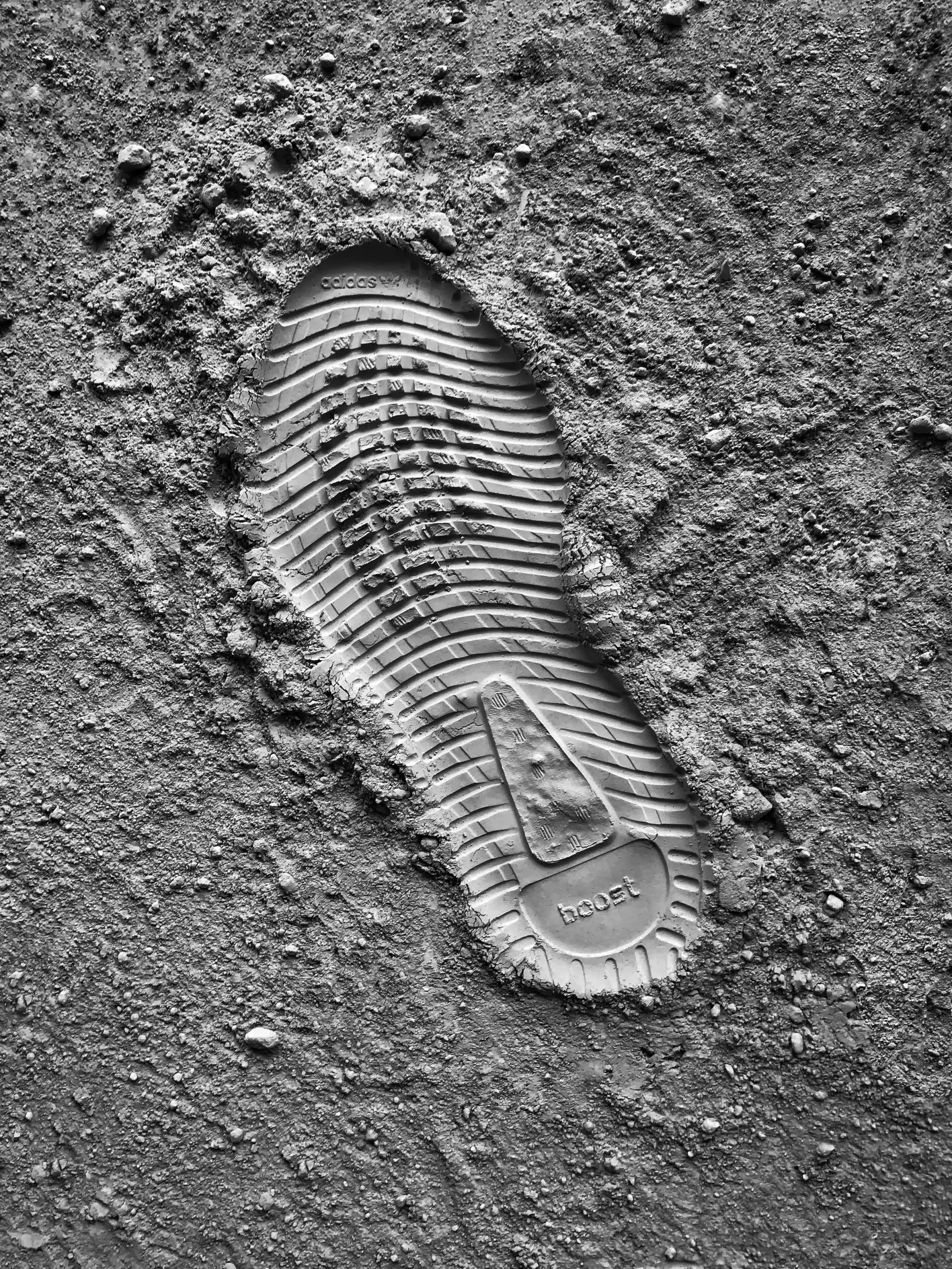 shoe's footprint in the sand